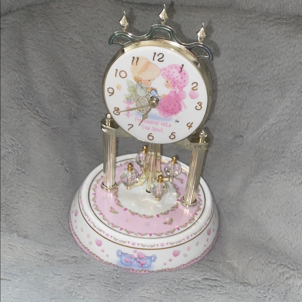 Elegant Pink and Gold Clock with Vintage Charm